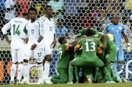 Zambia players celebrate at the team's goalkeeper scored a penalty on January 25, 2013
